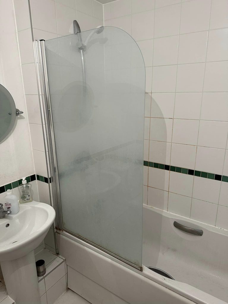 end of tenancy cleaning of shower glass before